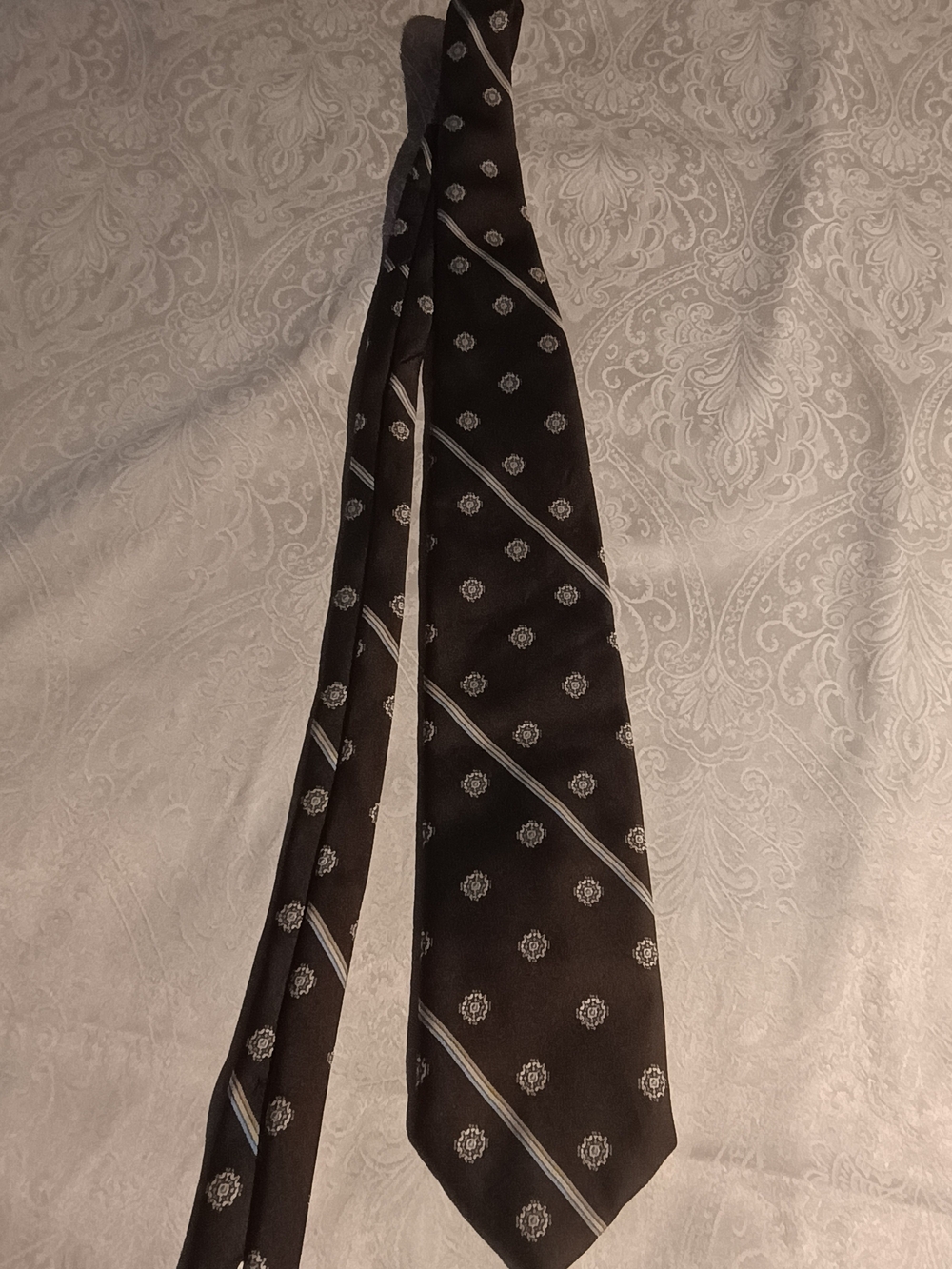 Damo Black Tie with Silver Medallion and Diagonal Stripes